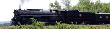 Steam Train passing by the Monument